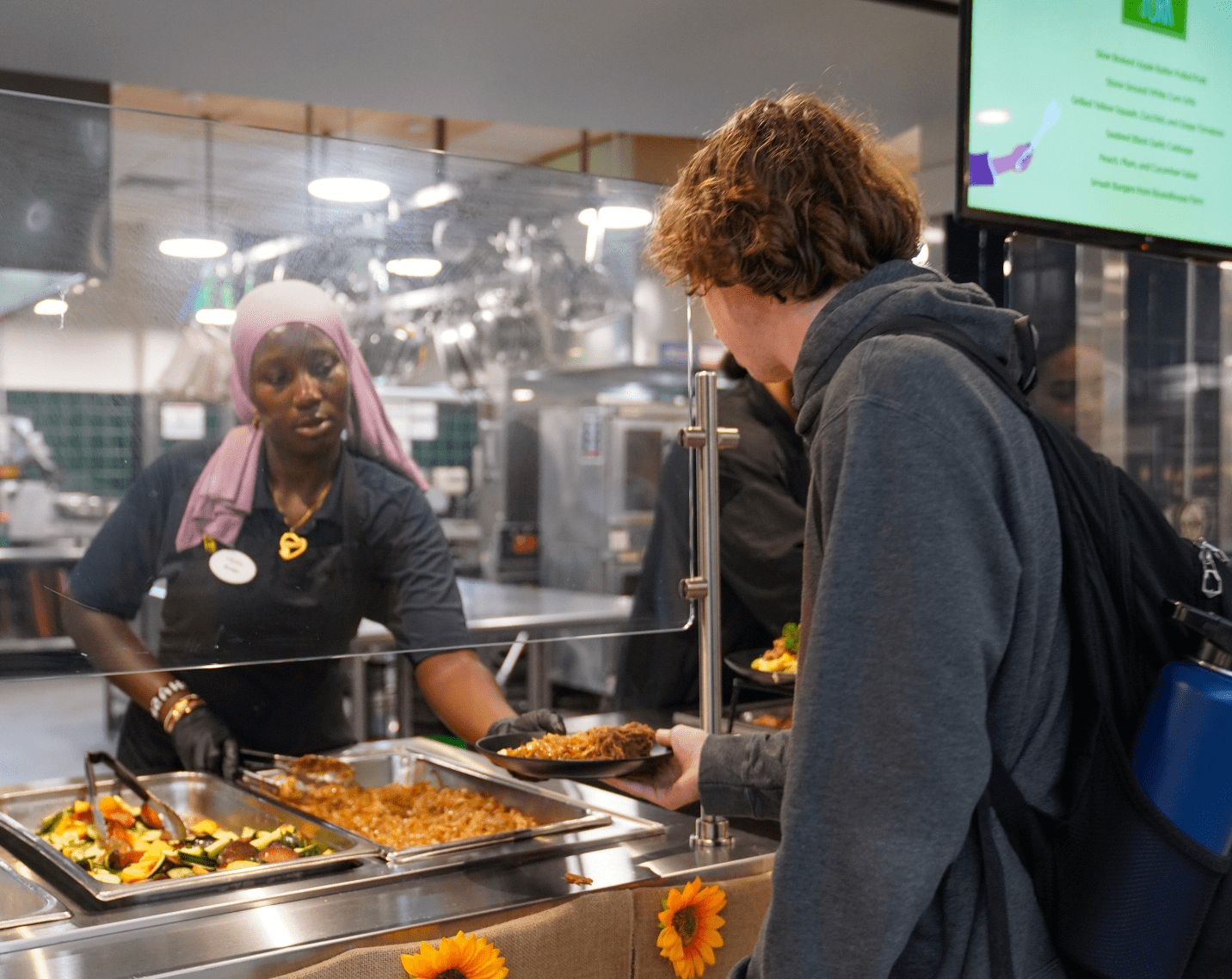 A student grabs a meal at UVA Dine's Farm to Fork event. 
